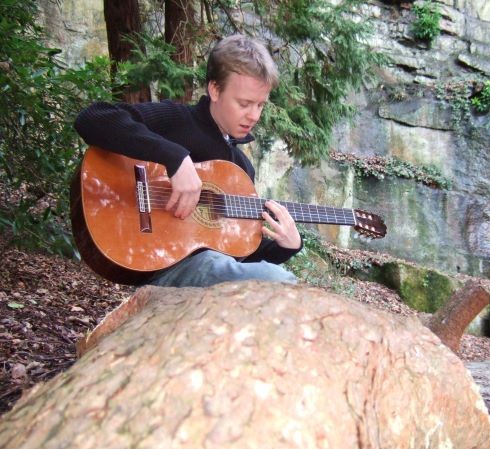 Martin with his guitar in Williamson Park